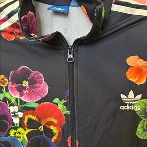 Adidas brand. Black Floral Pansy Track Jacket pair with jeans + sneakers.